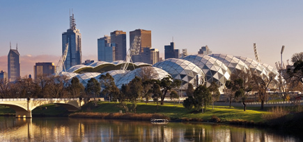 Geodesic AAMI Park Stadium set against the beauty of the Yarra River that flows through the City of Melbourne. Architects: Cox Architects.